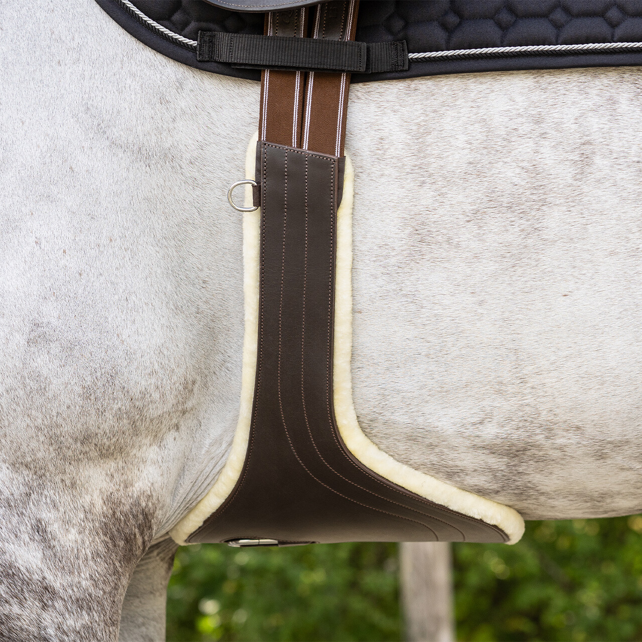 Belly guard girth with removable fur