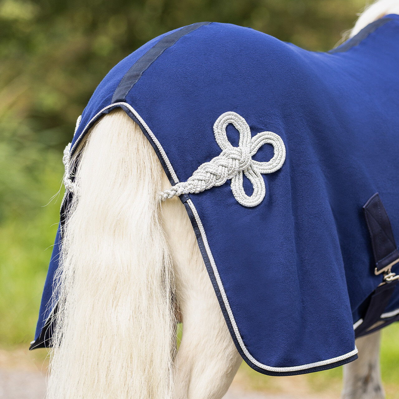 Fleece rug with ornament falabella